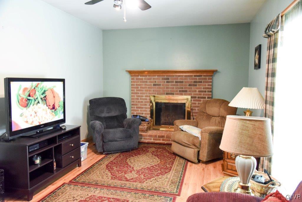 974 Renaldi Road Wind Gap, PA 18091 - Photo 17 of 40 a living room with furniture and a flat screen tv
