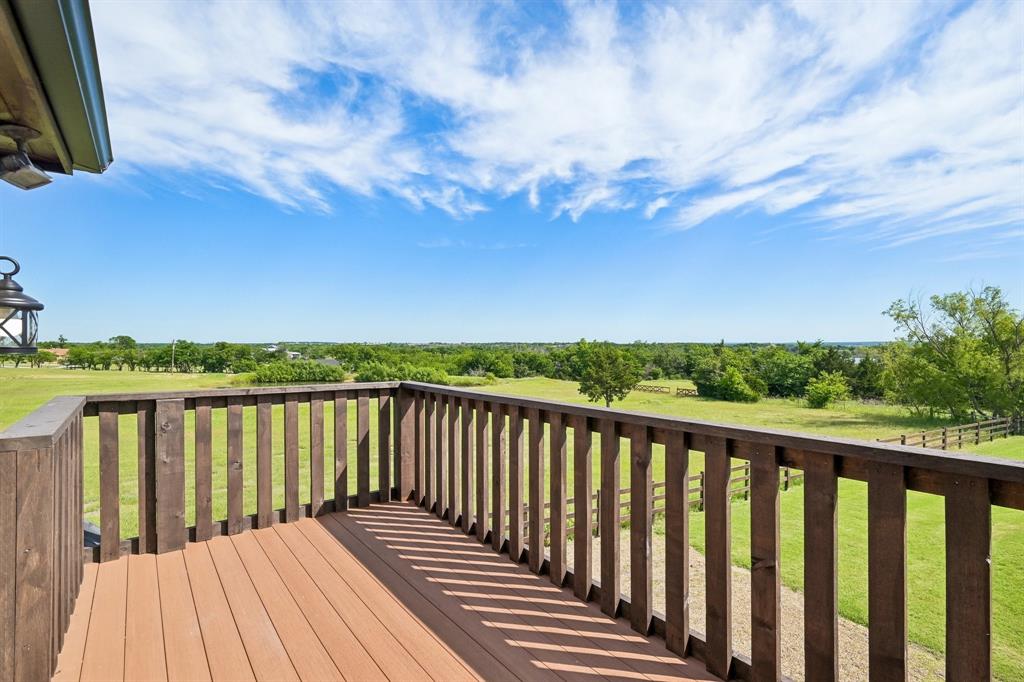 2085 Switzer Road Sanger, TX 76266 - Photo 26 of 39 Outdoor deck featuring composite decking and wooden railing