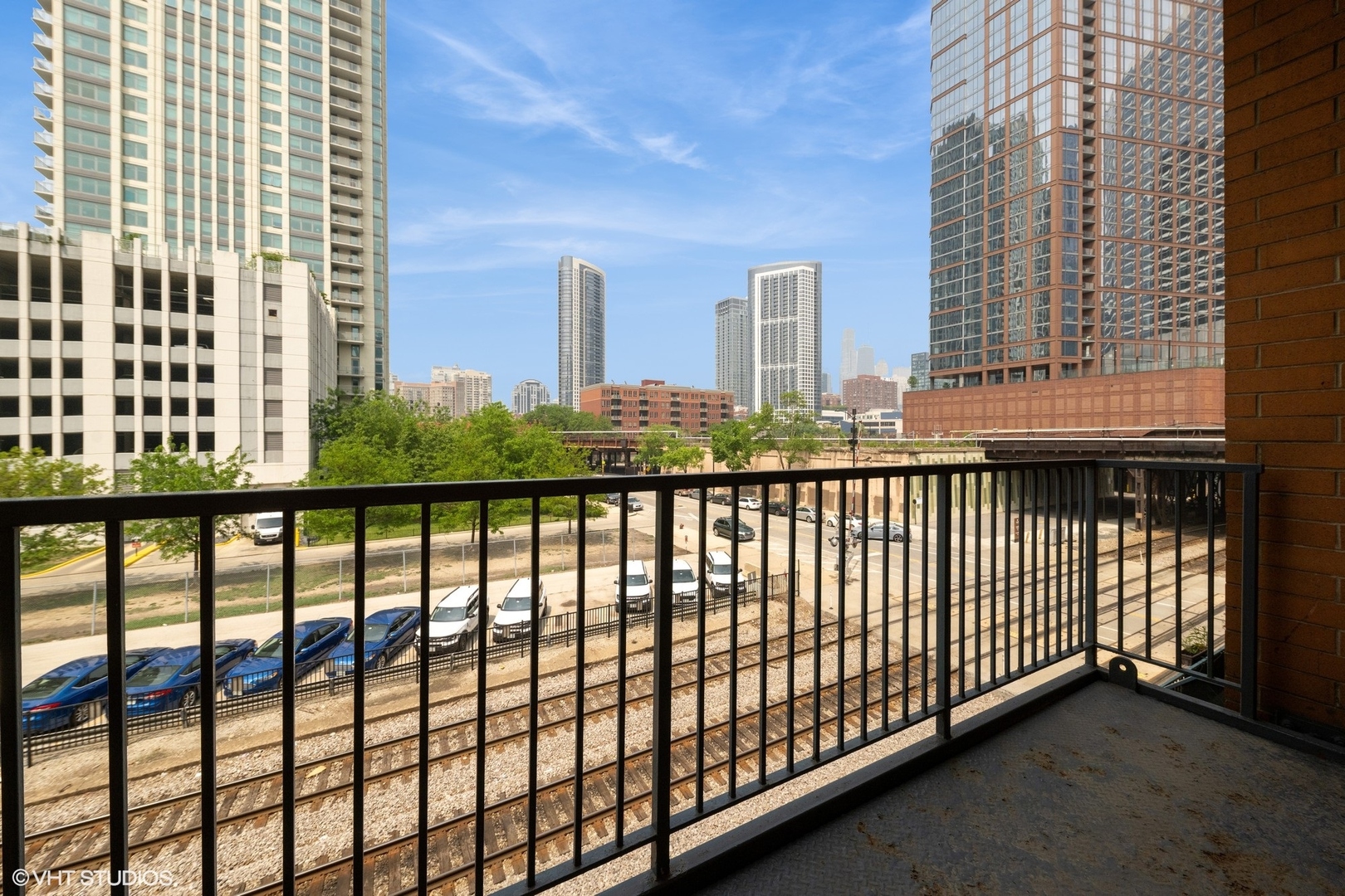 330 North Clinton Street, Unit 303 Chicago, IL 60661 - Photo 13 of 14 a view of city from a balcony