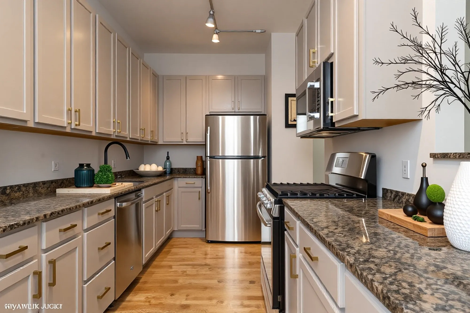 330 North Clinton Street, Unit 303 Chicago, IL 60661 - Photo 6 of 14 a kitchen with stainless steel appliances granite countertop a sink stove and refrigerator
