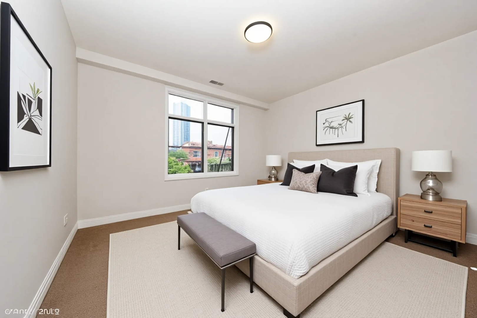 330 North Clinton Street, Unit 303 Chicago, IL 60661 - Photo 8 of 14 a bedroom with a bed and a window