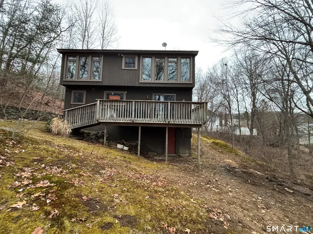 a house with trees in front of it