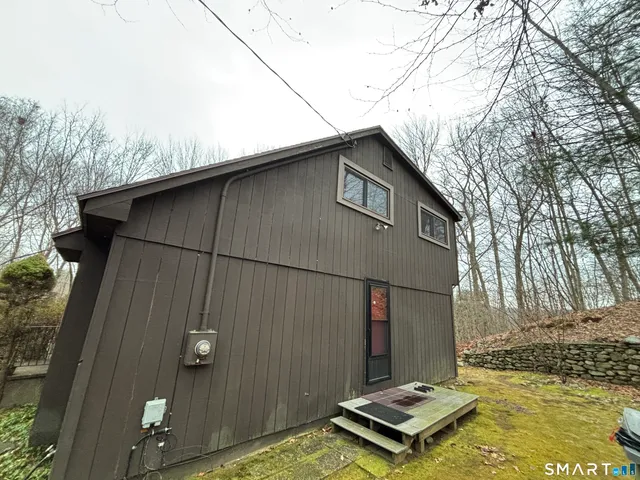 a backyard of a house with lots of green space