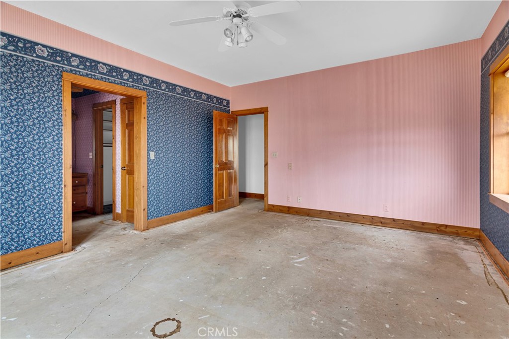 7550 Rancho Verano Place Paso Robles, CA 93446 - Photo 15 of 35 an empty room with a ceiling fan
