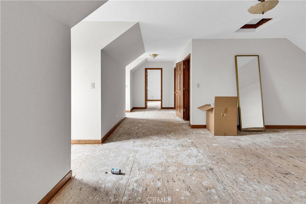 7550 Rancho Verano Place Paso Robles, CA 93446 - Photo 23 of 35 an empty room with windows and cabinet