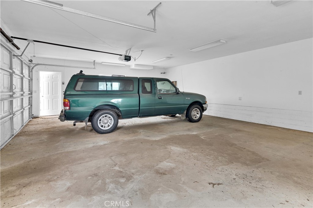 7550 Rancho Verano Place Paso Robles, CA 93446 - Photo 28 of 35 a car parked in a garage