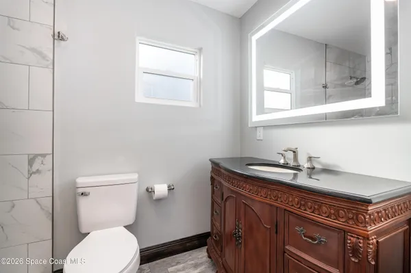 a bathroom with a sink and a toilet