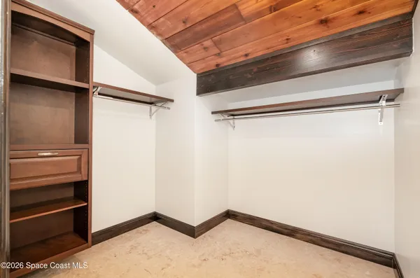 a view of an empty walk in closet