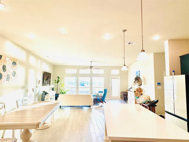 a stove top oven sitting inside of a kitchen