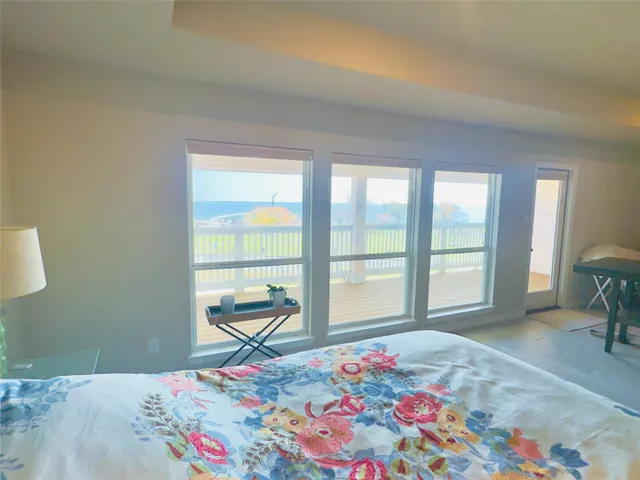 a living room with a bed and furniture