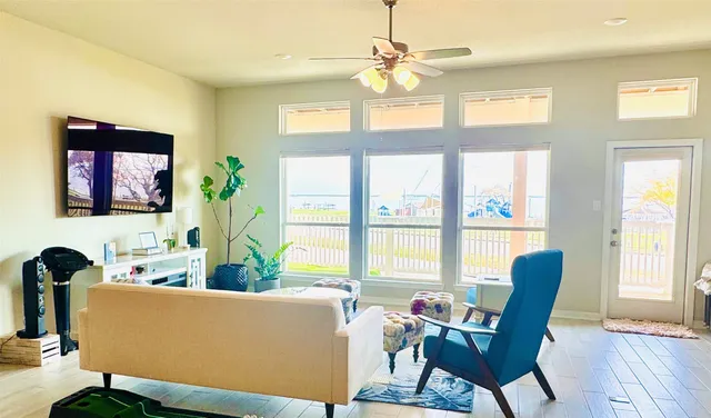 a kitchen with stainless steel appliances a refrigerator a sink a stove a microwave and cabinets