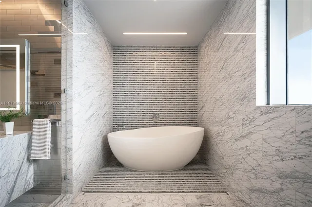 a view of a bathtub in a bathroom