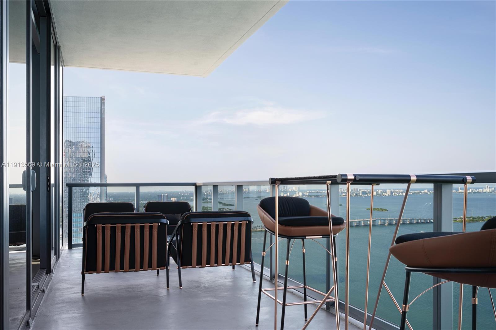 788 Northeast 23rd Street, Unit 4102 Miami, FL 33137 - Photo 21 of 41 a view of a balcony with chairs