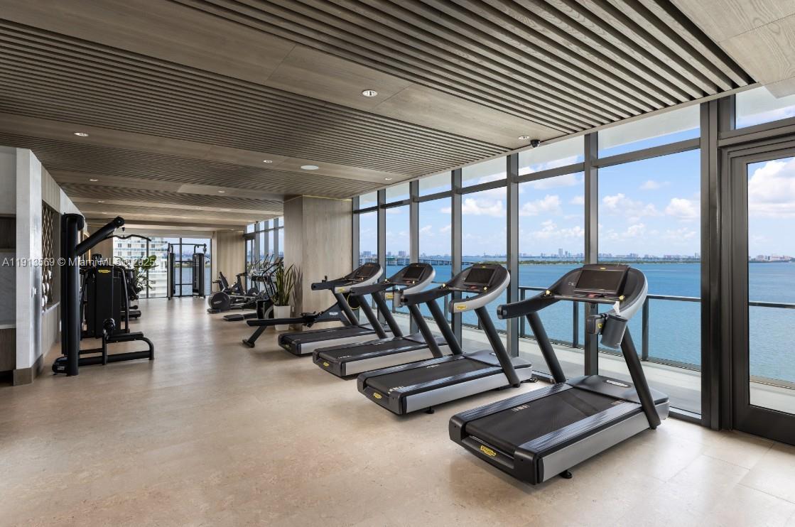 788 Northeast 23rd Street, Unit 4102 Miami, FL 33137 - Photo 28 of 41 a view of a room with gym equipment