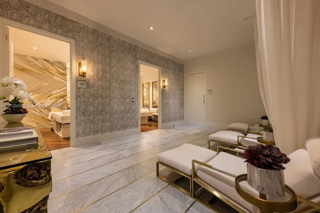 a bathroom with a shower and a mirror