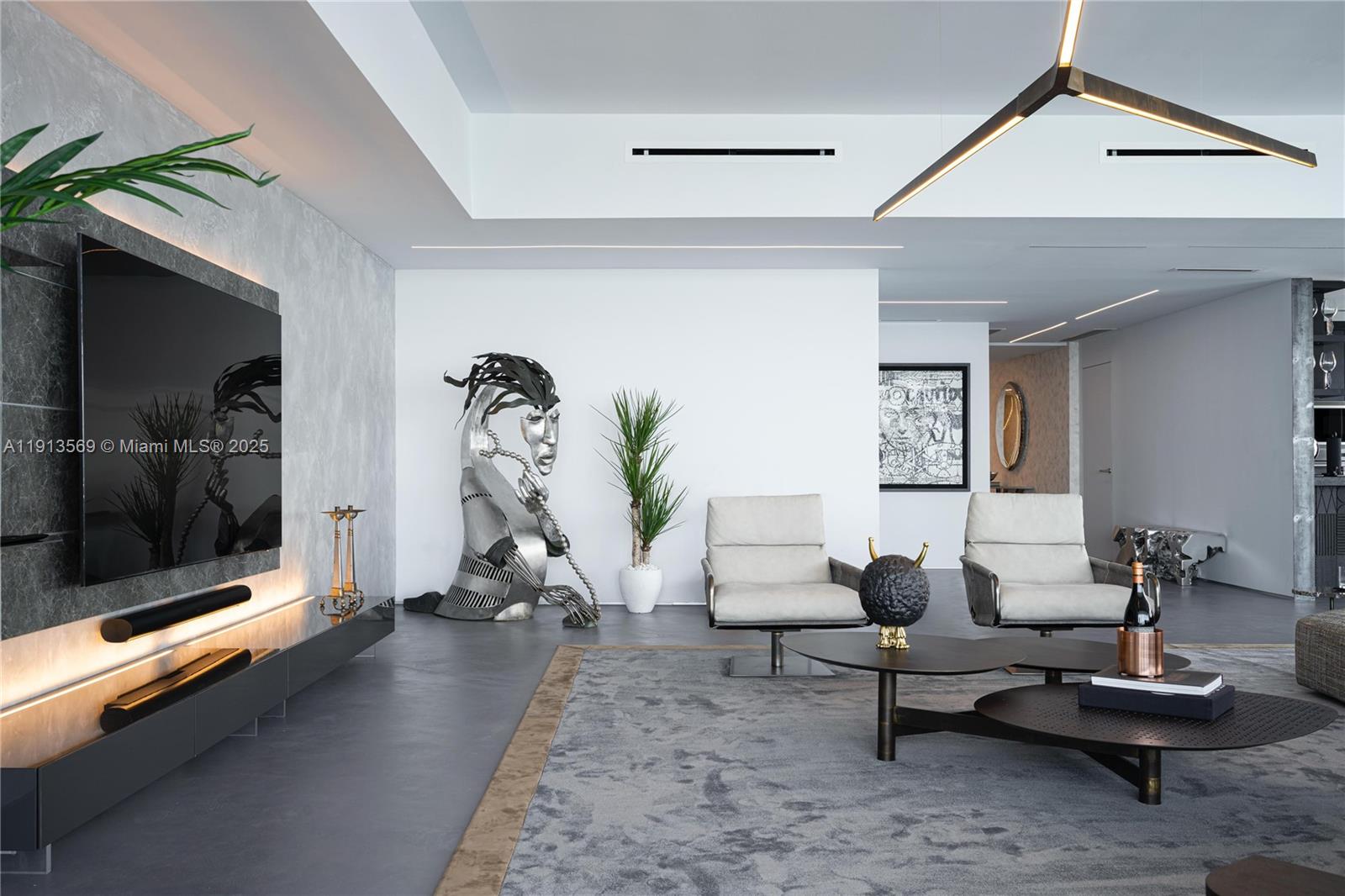 788 Northeast 23rd Street, Unit 4102 Miami, FL 33137 - Photo 3 of 41 a living room with furniture a window and a potted plant