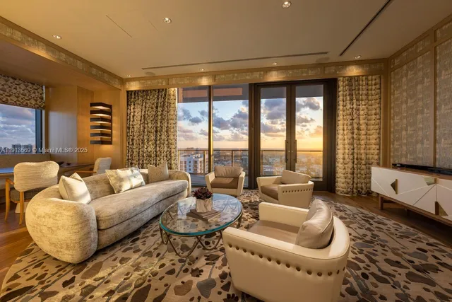 a bedroom with a bed and a chair