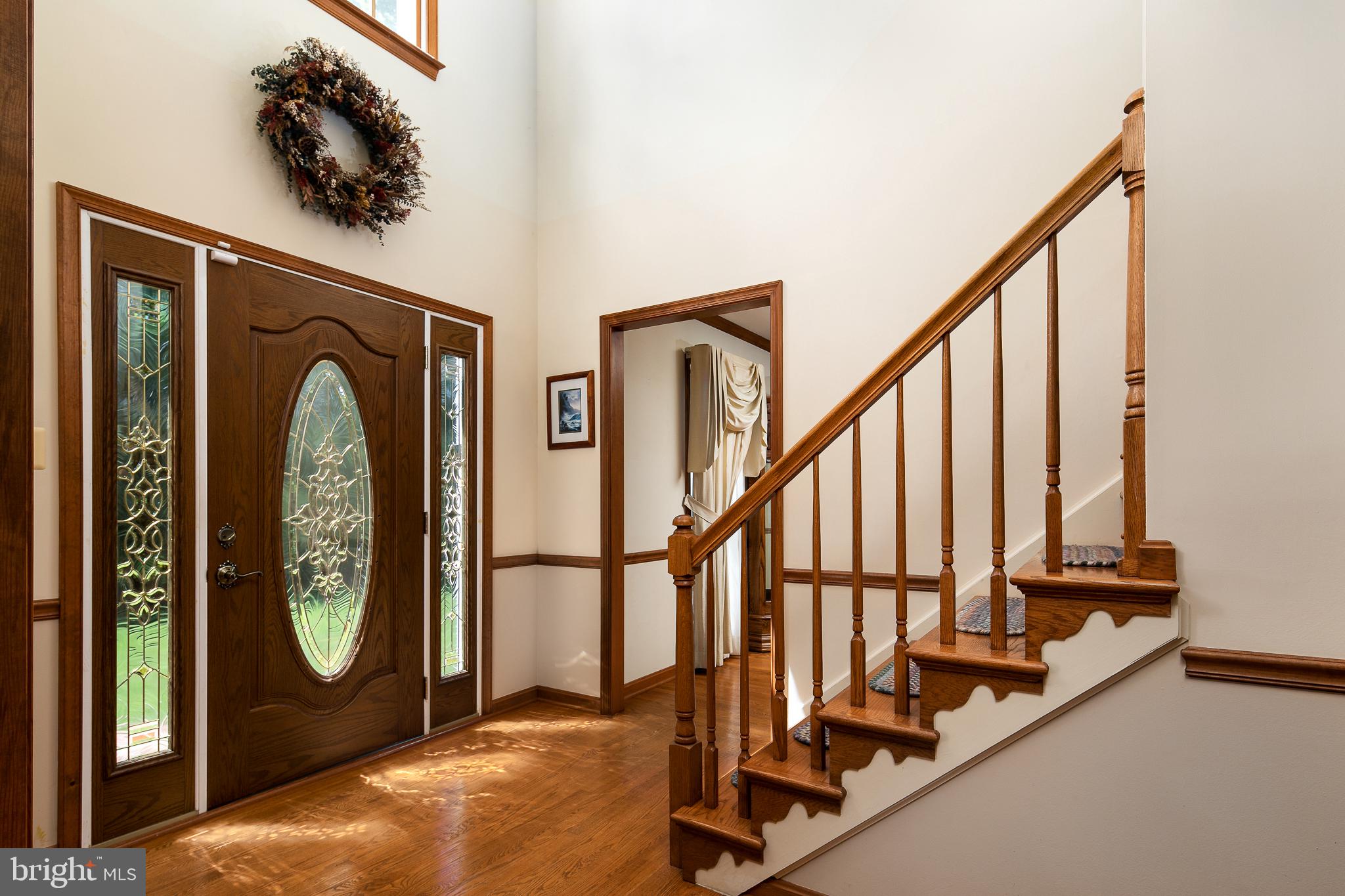 4287 Phoenix Road Bealeton, VA 22712 - Photo 20 of 41 Foyer Entry w/ hardwood flooring and Oak Stairway