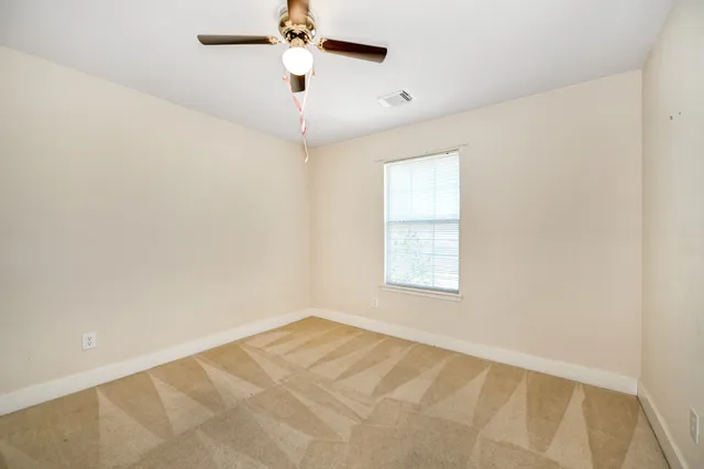 a bathroom with a sink and a large mirror