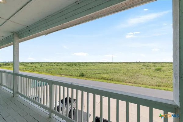 a view of ocean from a balcony