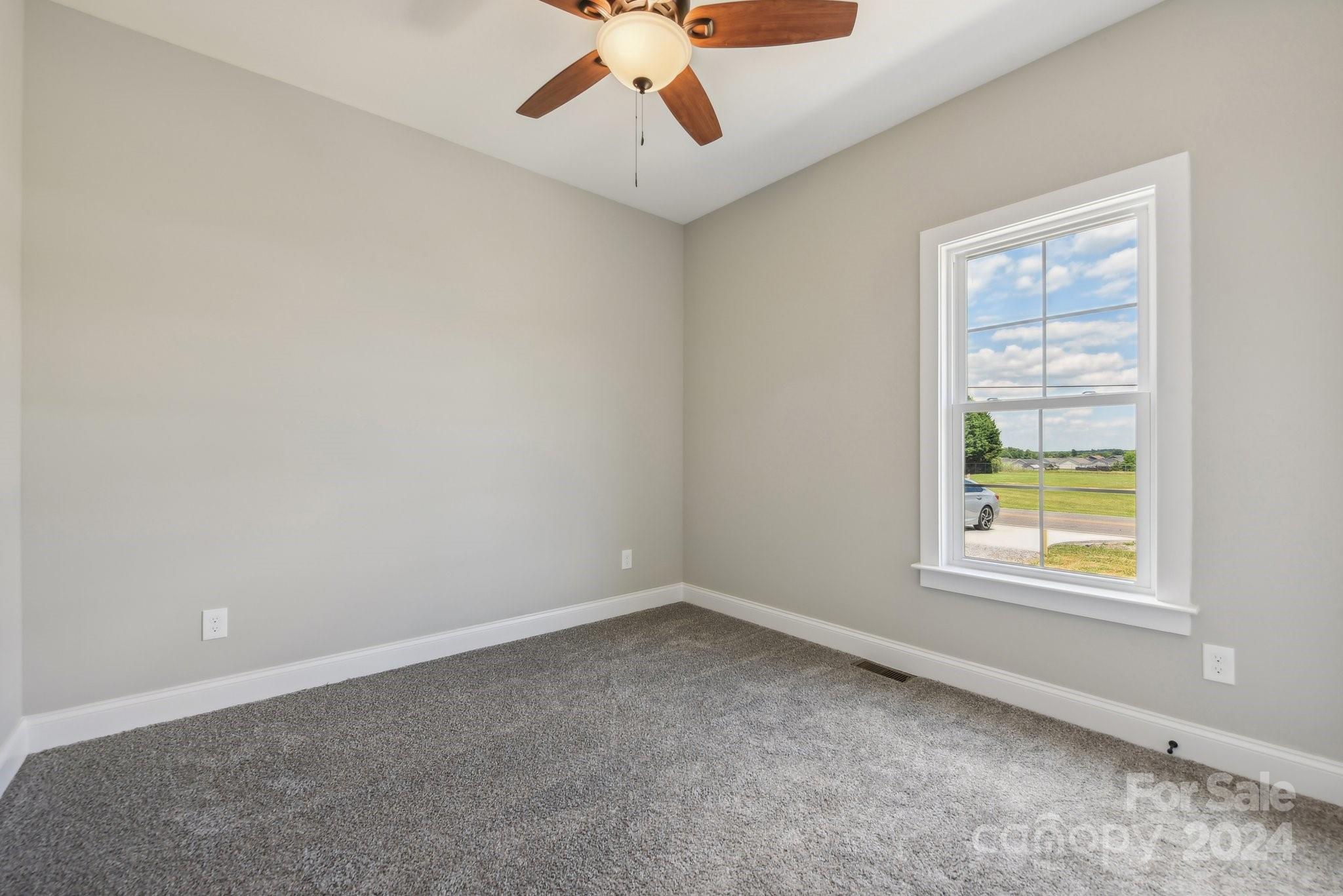 158 Wetmore Road Woodleaf, NC 27054 - Photo 24 of 33 an empty room with a window