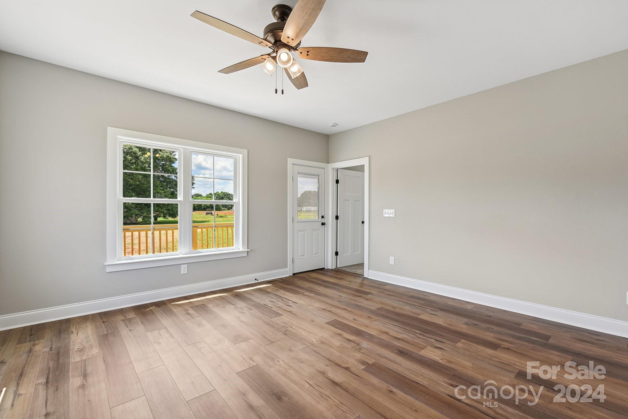 158 Wetmore Road Woodleaf, NC 27054 - Photo 7 of 33 a view of an empty room with a window