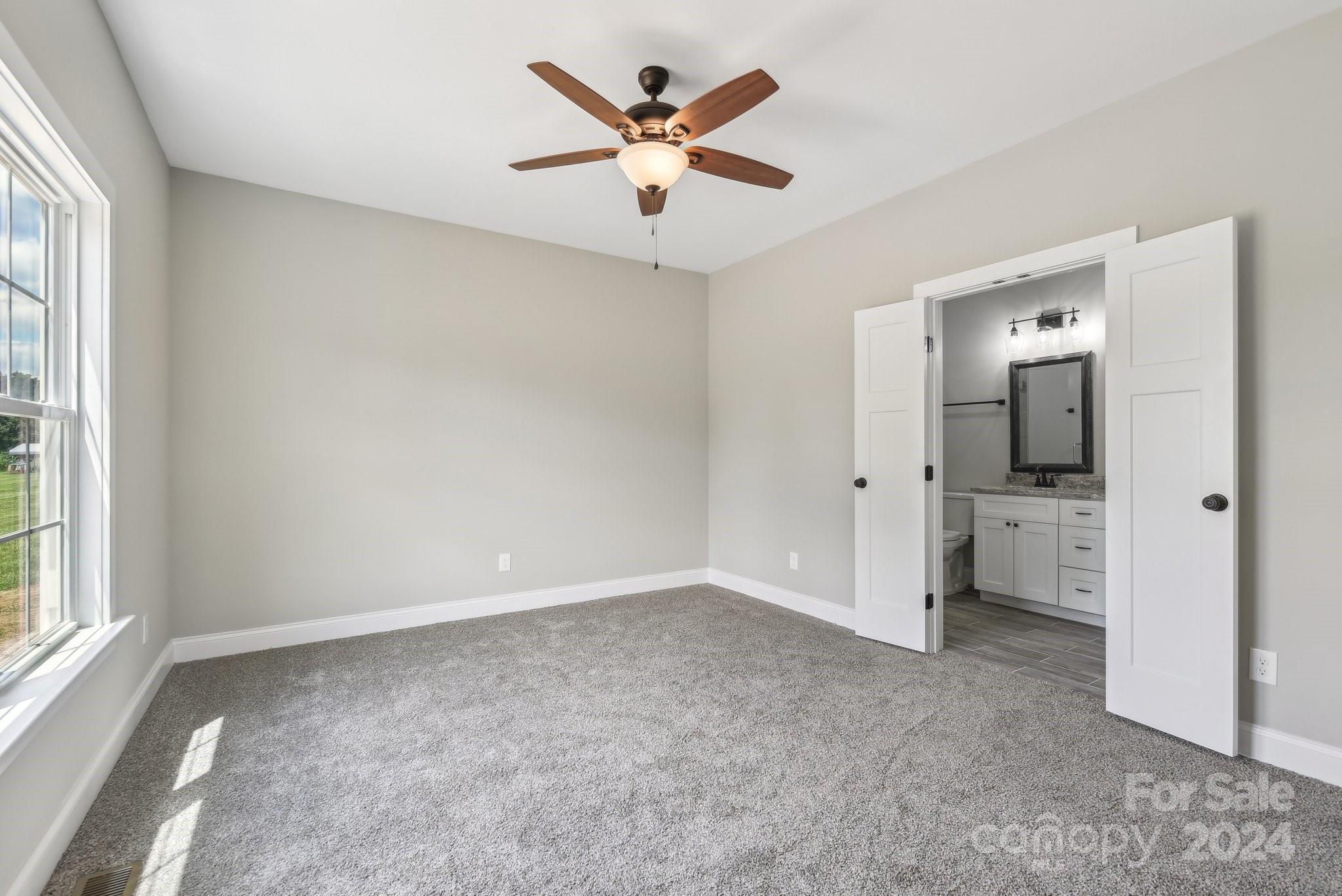 158 Wetmore Road Woodleaf, NC 27054 - Photo 10 of 33 a view of an empty room