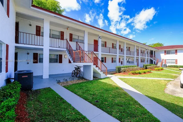 a view of a house with a swimming pool
