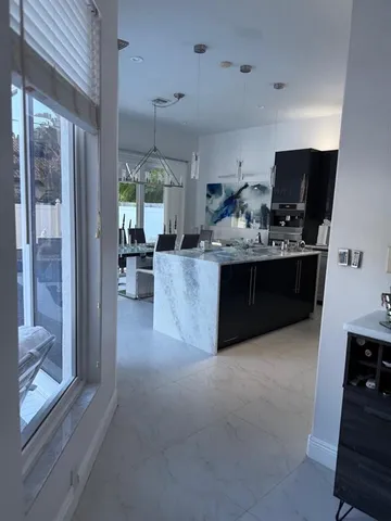 a view of living room with furniture and window