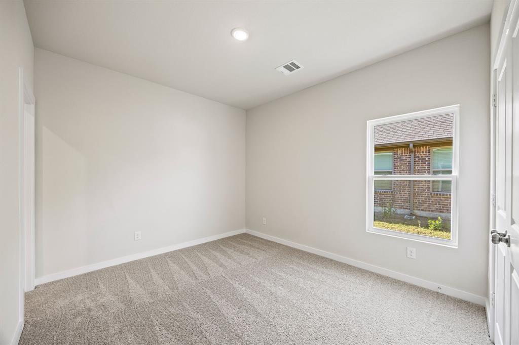 1012 Verde Valley Lane Crowley, TX 76036 - Photo 13 of 19 an empty room with a window