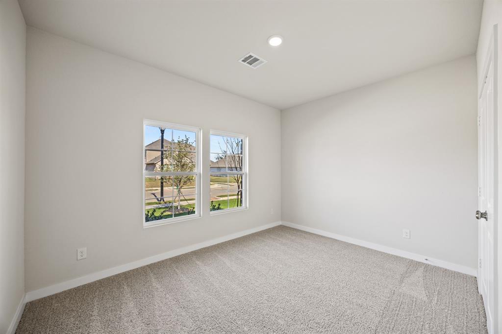 1012 Verde Valley Lane Crowley, TX 76036 - Photo 9 of 19 an empty room with a window