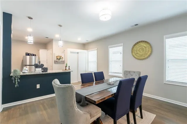 a view of a dining room with furniture
