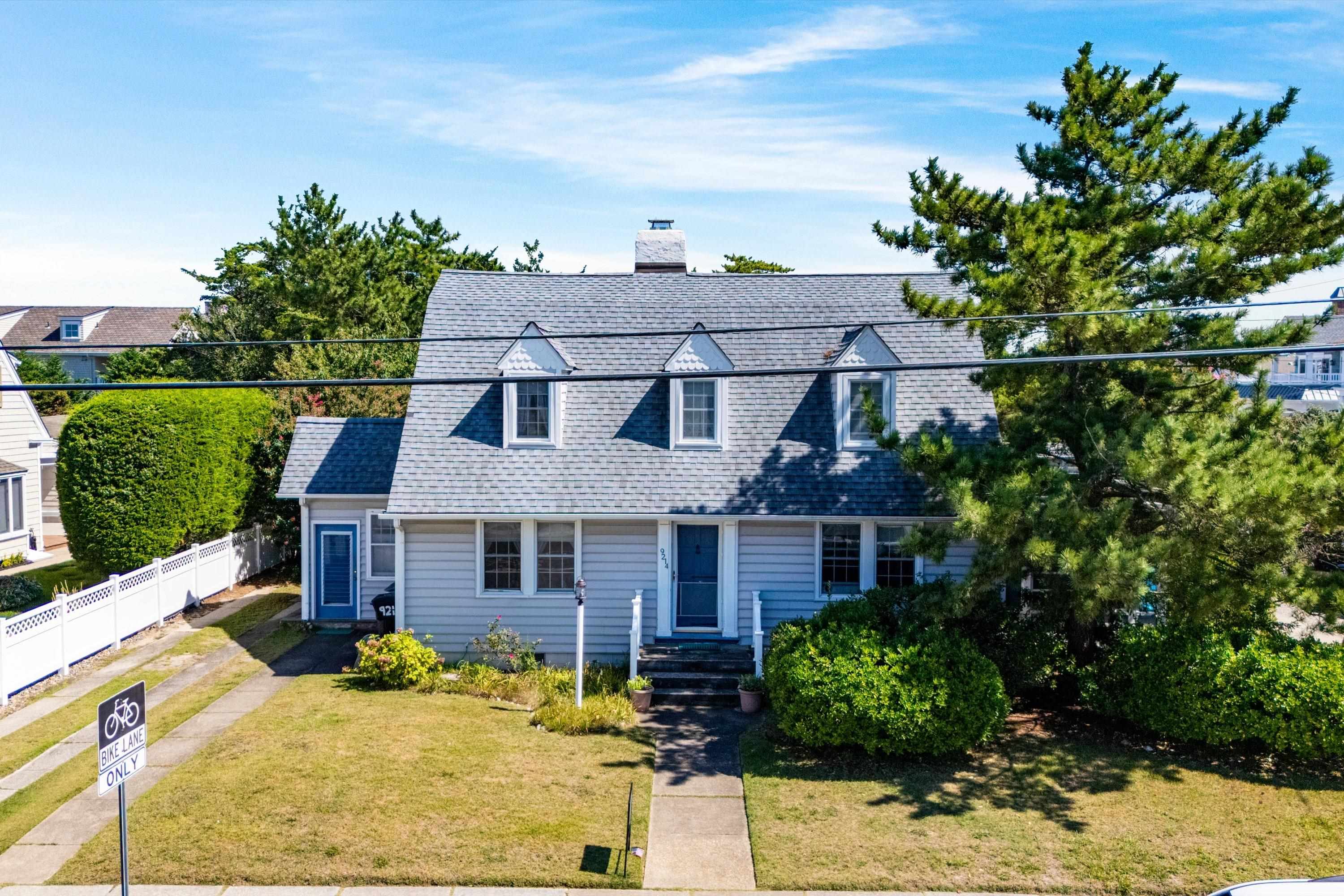9214 2nd Avenue Stone Harbor, NJ 08247 - Photo 13 of 14 front view of a house with a yard