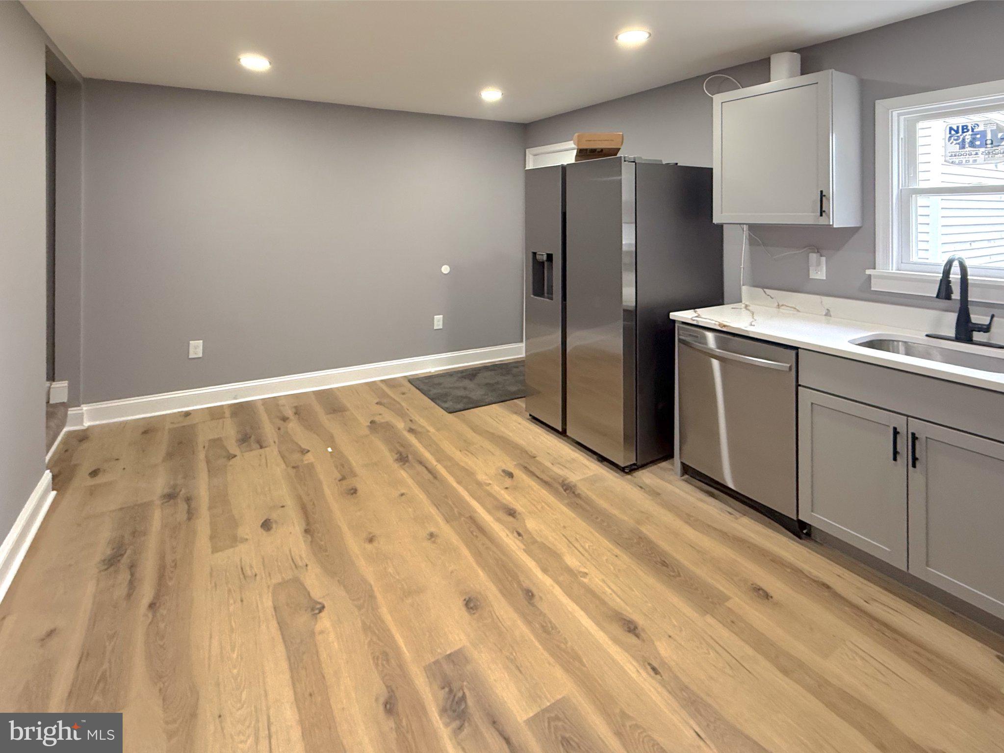 3703 6th Street, Unit 2 Baltimore, MD 21225 - Photo 3 of 20 Modern kitchen with sleek finishes.