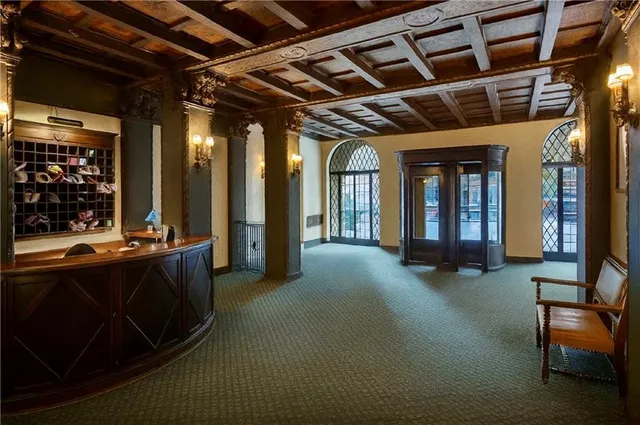 a view of lobby with furniture and floor to ceiling window