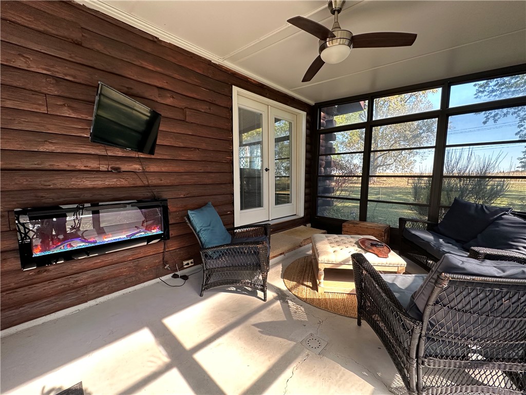 4286 State Street Geneva, NY 14456 - Photo 22 of 26 Fireplace and TV