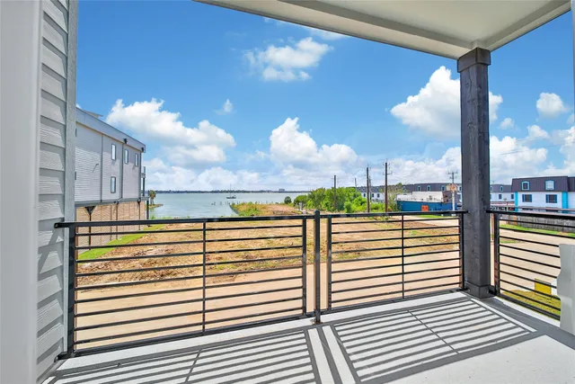 a view of a balcony with city view