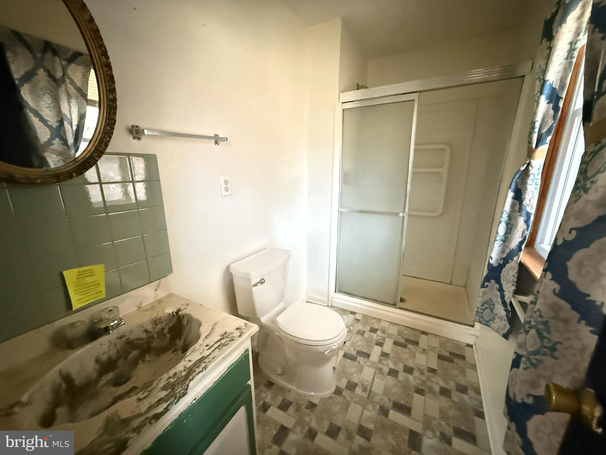 82 Broad Run Road Bentonville, VA 22610 - Photo 11 of 21 a bathroom with a sink and a mirror