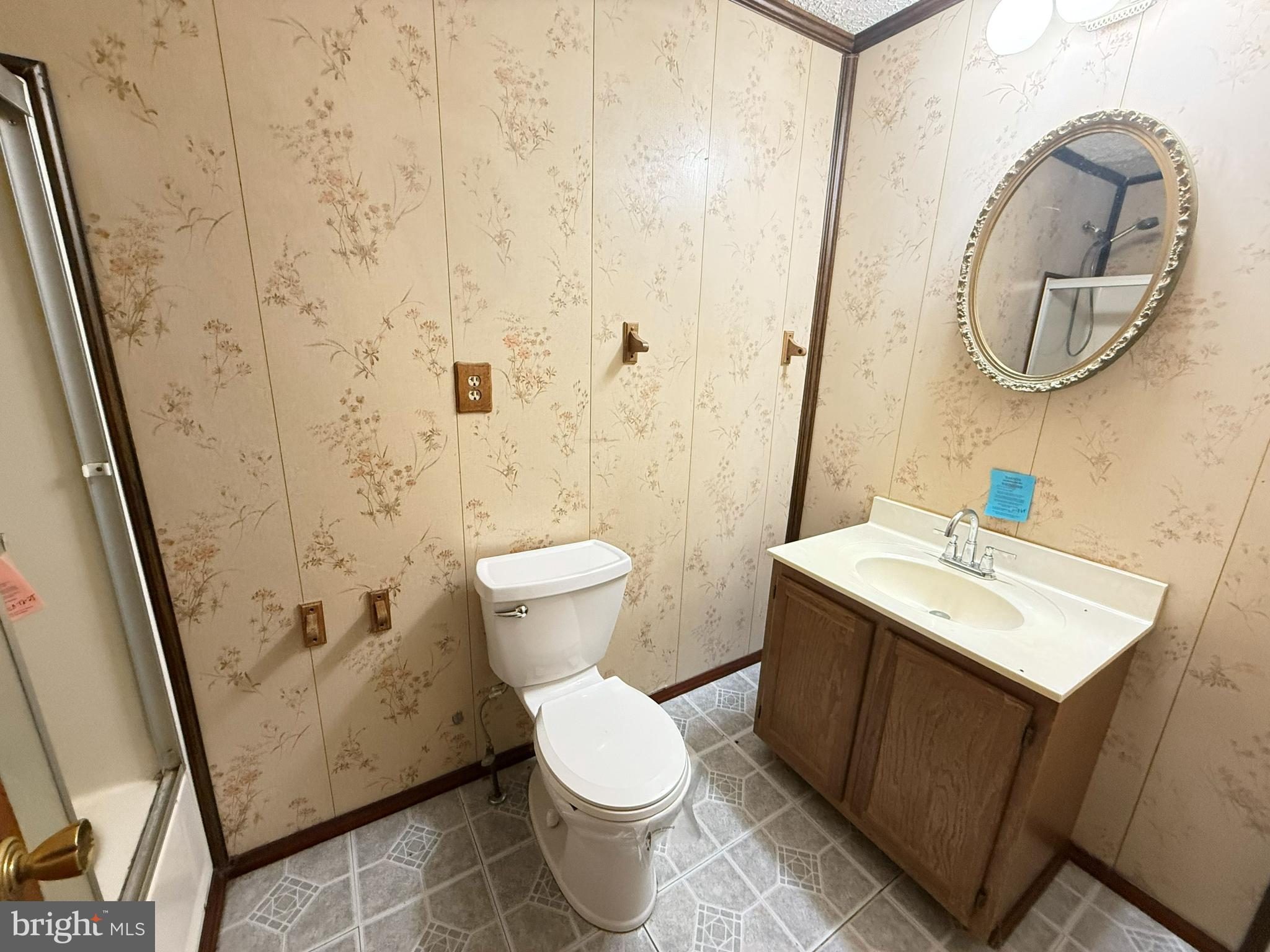 82 Broad Run Road Bentonville, VA 22610 - Photo 14 of 21 a bathroom with a toilet sink and mirror