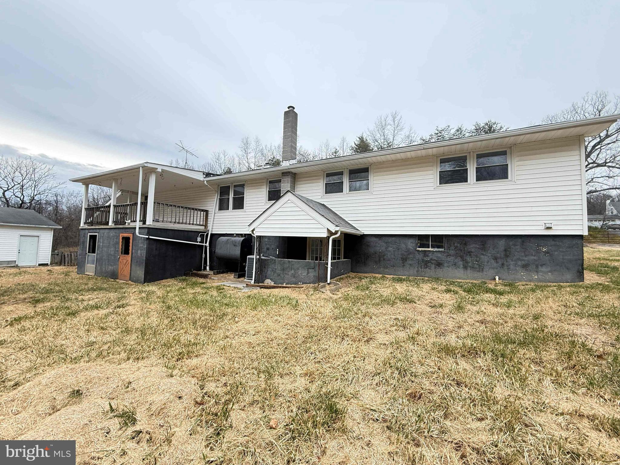 82 Broad Run Road Bentonville, VA 22610 - Photo 20 of 21 a house with a swimming pool in front of it