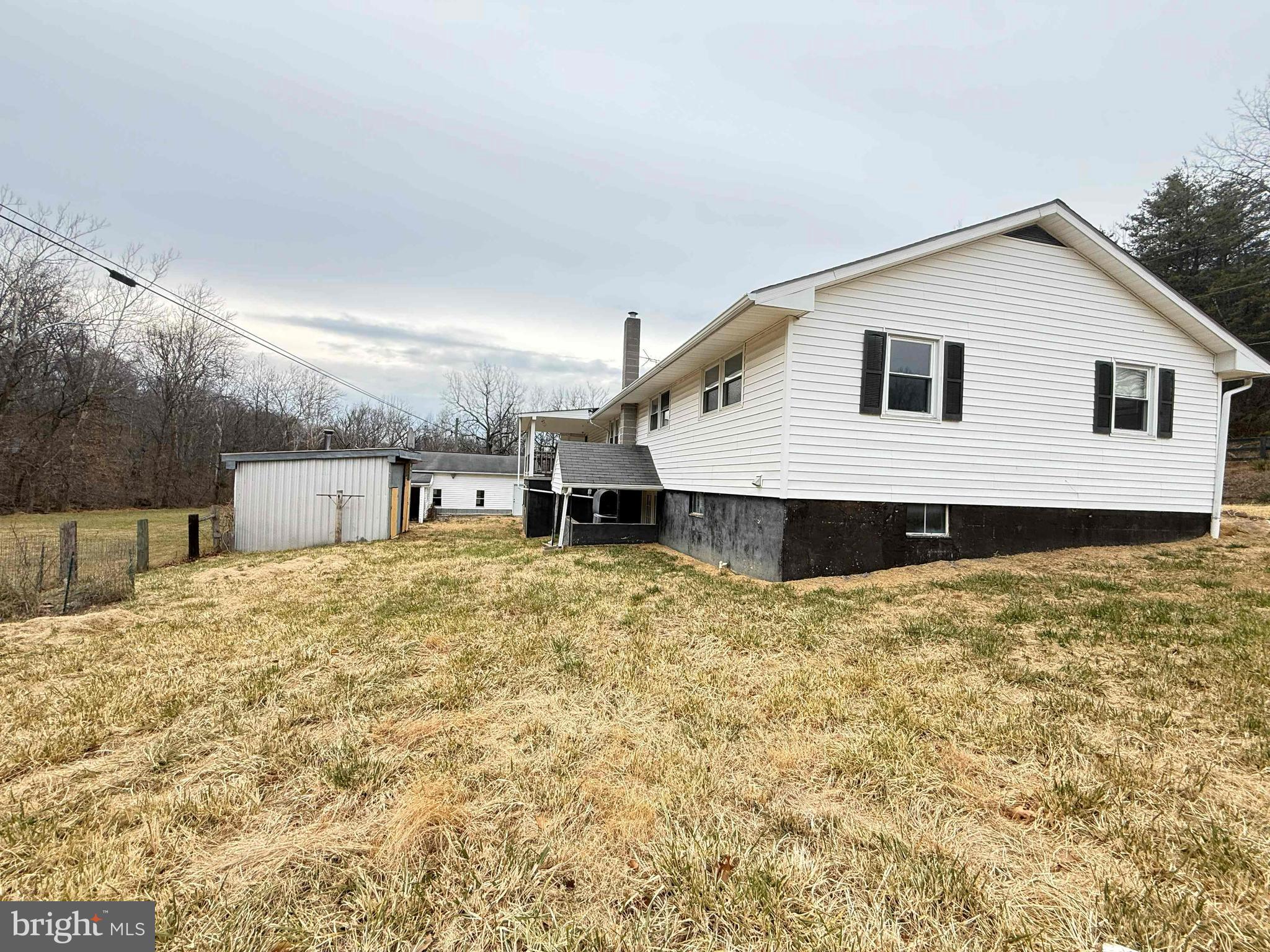 82 Broad Run Road Bentonville, VA 22610 - Photo 4 of 21 a view of a house with a yard