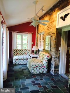 11279 Russell Road Purcellville, VA 20132 - Photo 14 of 30 SUNROOM OVERLOOKS PEACEFUL YARD