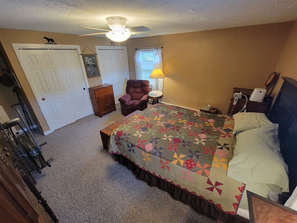46 Evergreen Road, Unit 210 Leeds, MA 01053 - Photo 29 of 34 a bedroom with bed and window