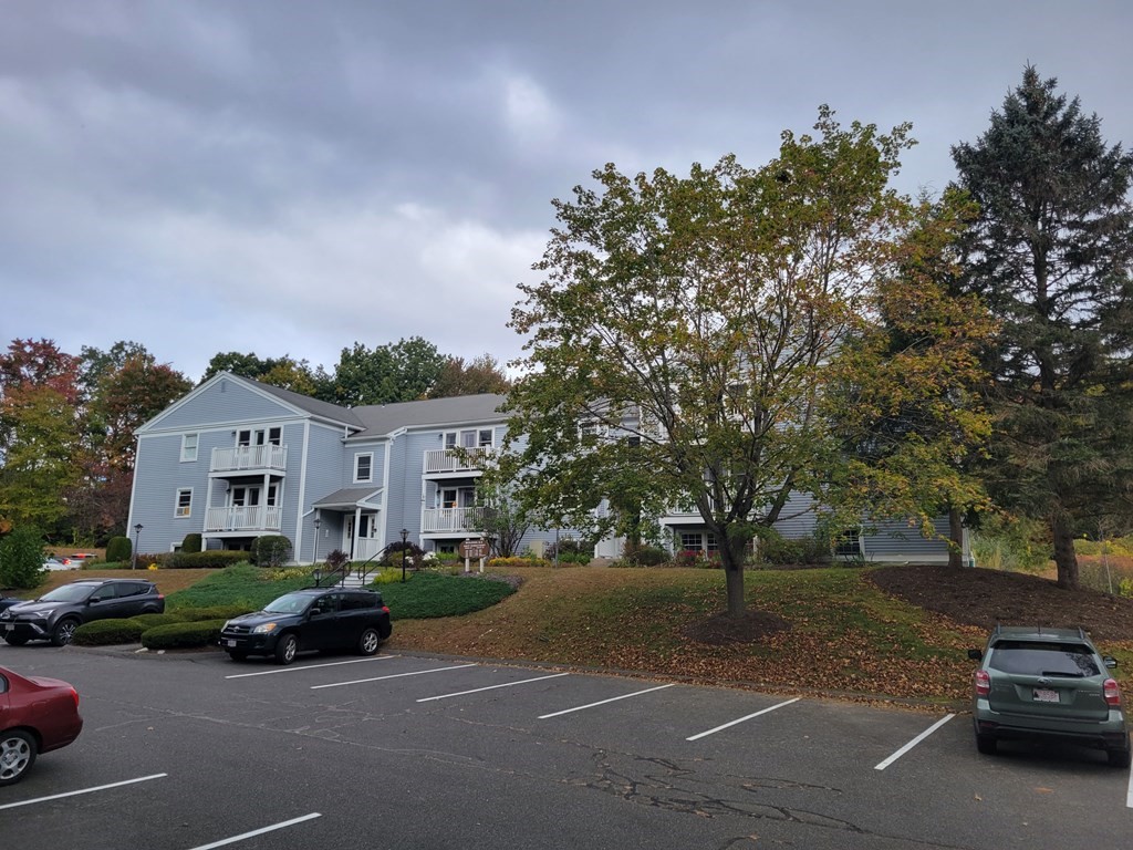 46 Evergreen Road, Unit 210 Leeds, MA 01053 - Photo 3 of 34 a view of street with parked cars