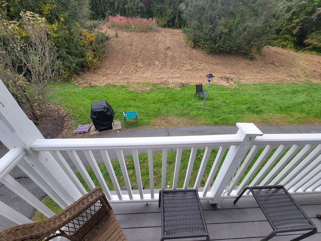 46 Evergreen Road, Unit 210 Leeds, MA 01053 - Photo 7 of 34 a view of a backyard with sitting area