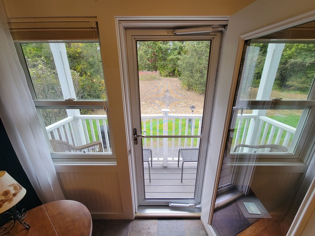 46 Evergreen Road, Unit 210 Leeds, MA 01053 - Photo 10 of 34 a view of room with window and front door