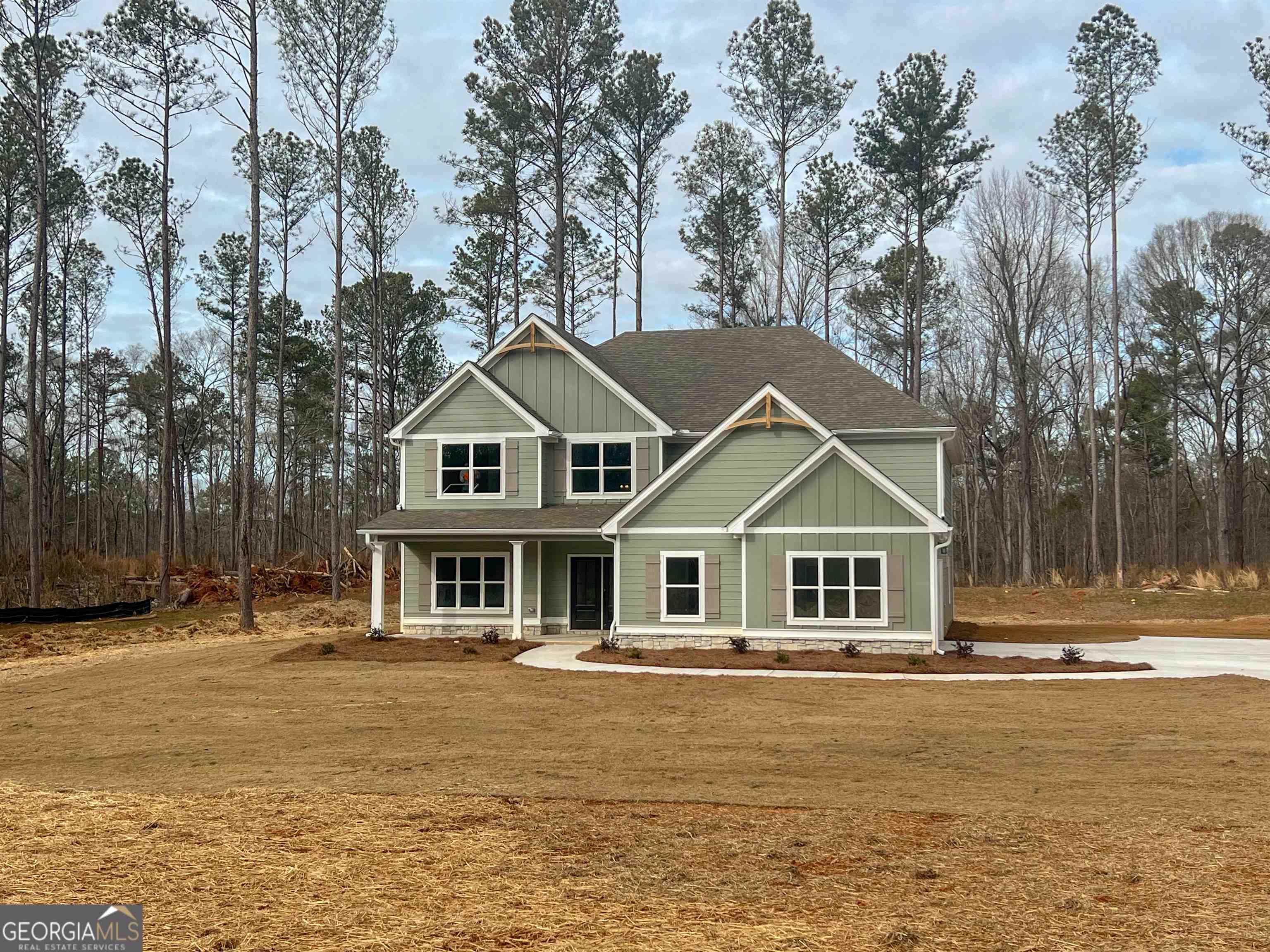 254 Field Road Griffin, GA 30223 - Photo 1 of 1 a house with river in front of it