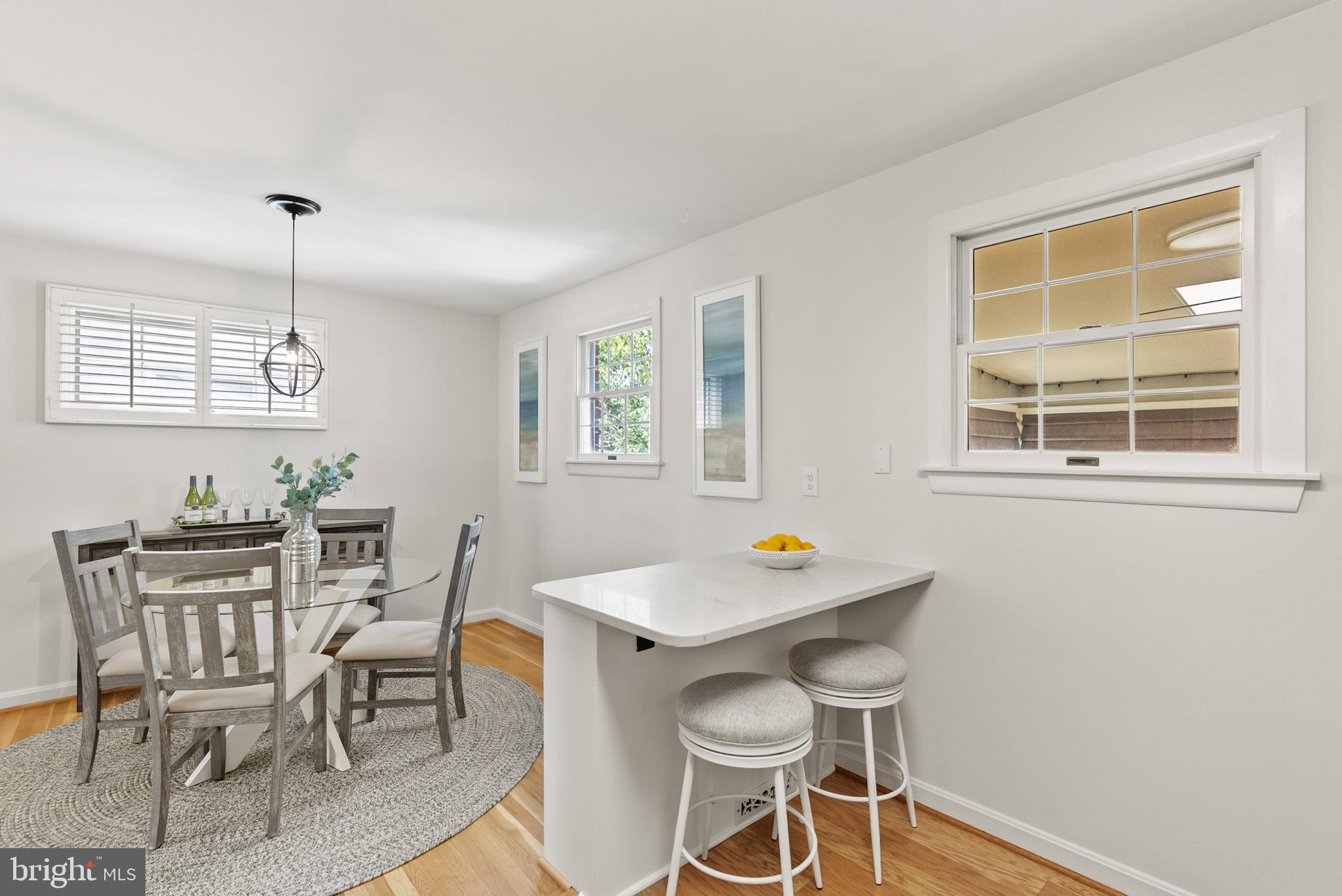 4703 Wyaconda Road Rockville, MD 20852 - Photo 11 of 40 a view of a dining room with furniture and window