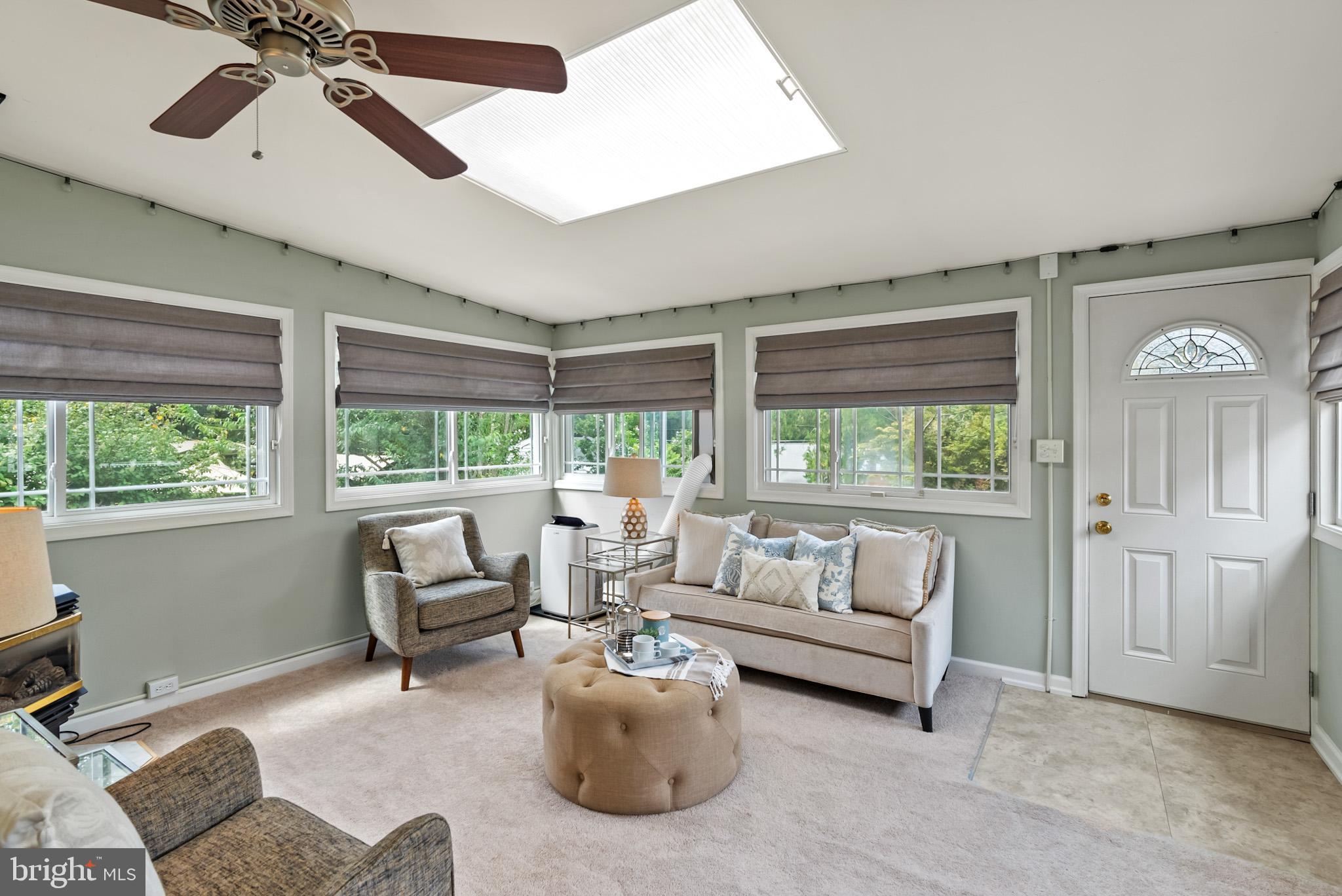 4703 Wyaconda Road Rockville, MD 20852 - Photo 17 of 40 a living room with furniture and a large window