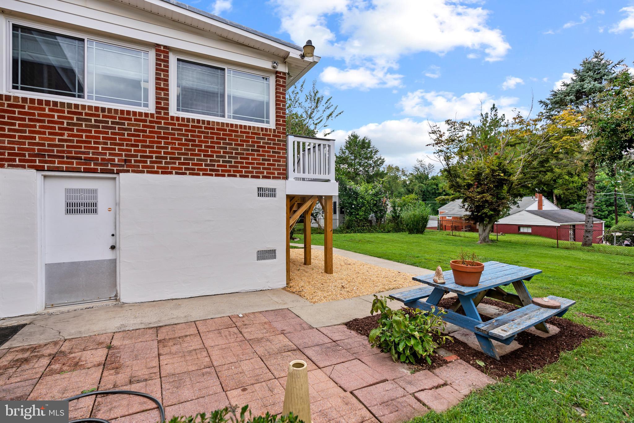 4703 Wyaconda Road Rockville, MD 20852 - Photo 39 of 40 a front view of a house with garden
